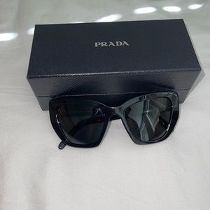 Prada Cateye Sunglasses in black!